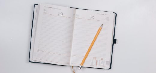 pencil on opened notebook