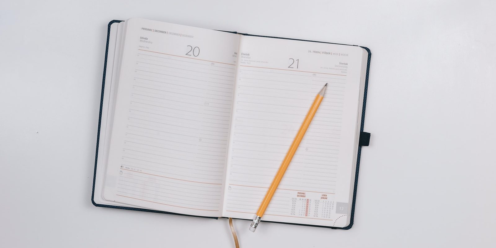 pencil on opened notebook